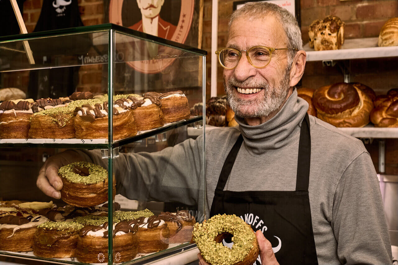 Ray Rinkoff master baker holding a pistachio Crodough